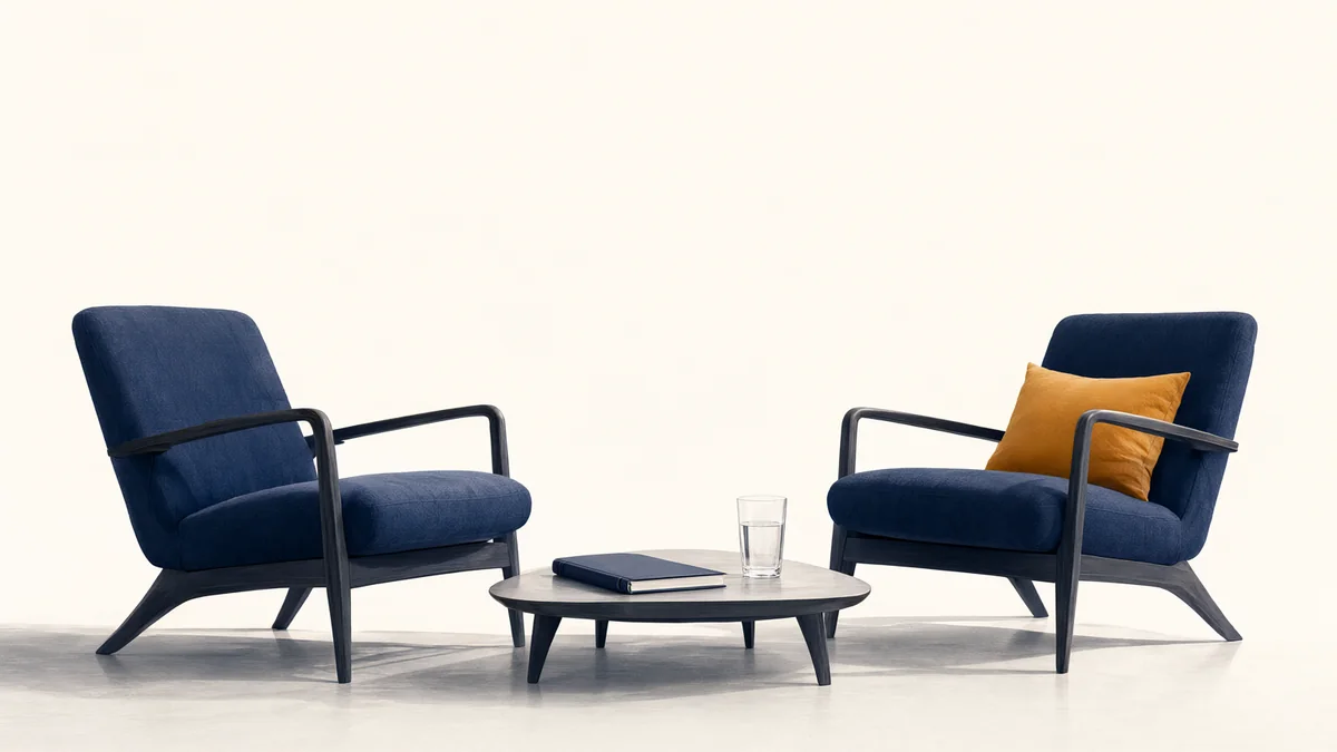 Two chairs and a notebook in a calm consultation space.